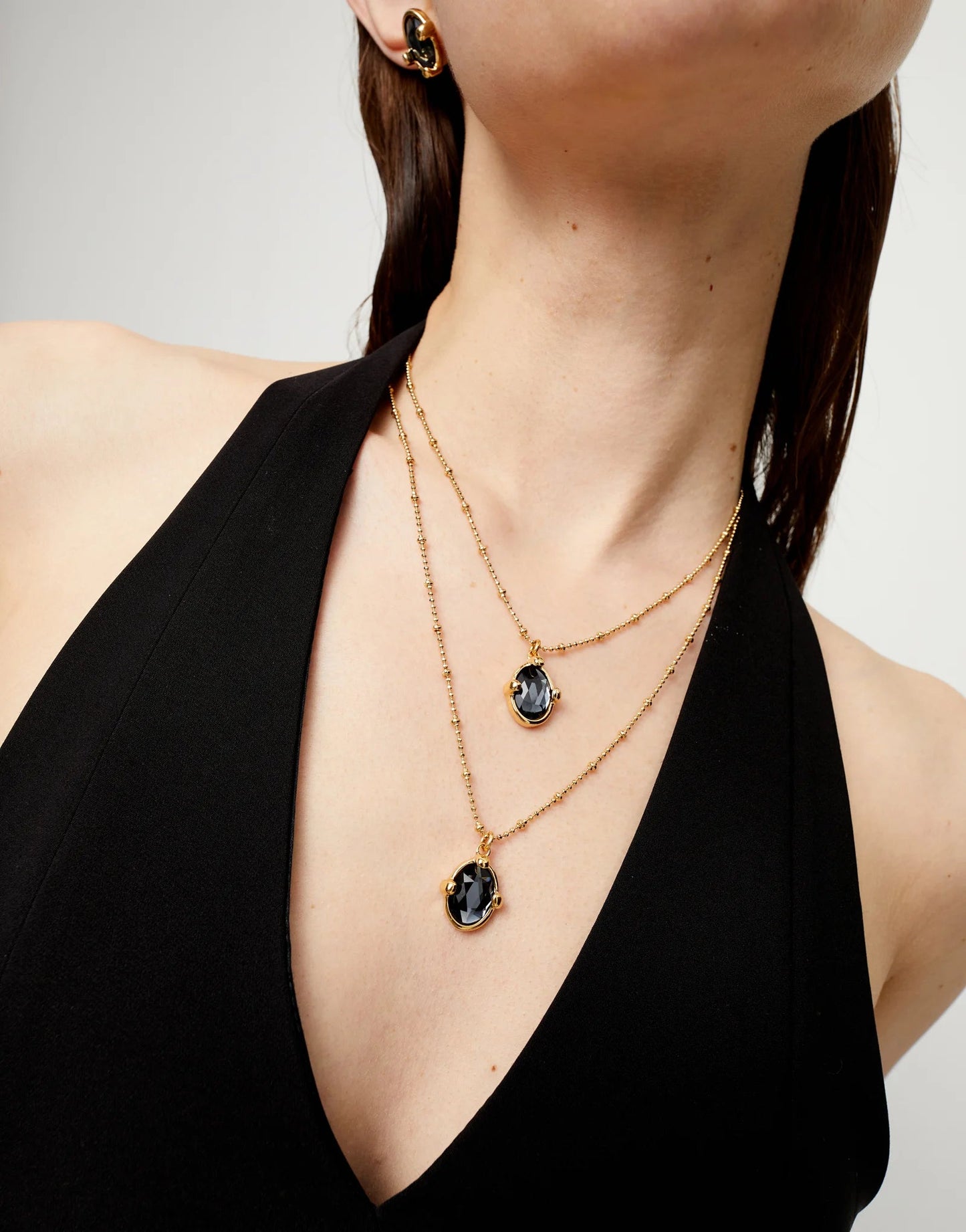 Collana Uno de 50 doppia placcata oro 18 carati con due cristalli ovali sfaccettati neri - COL2030 - Simmi Gioiellerie - Collane