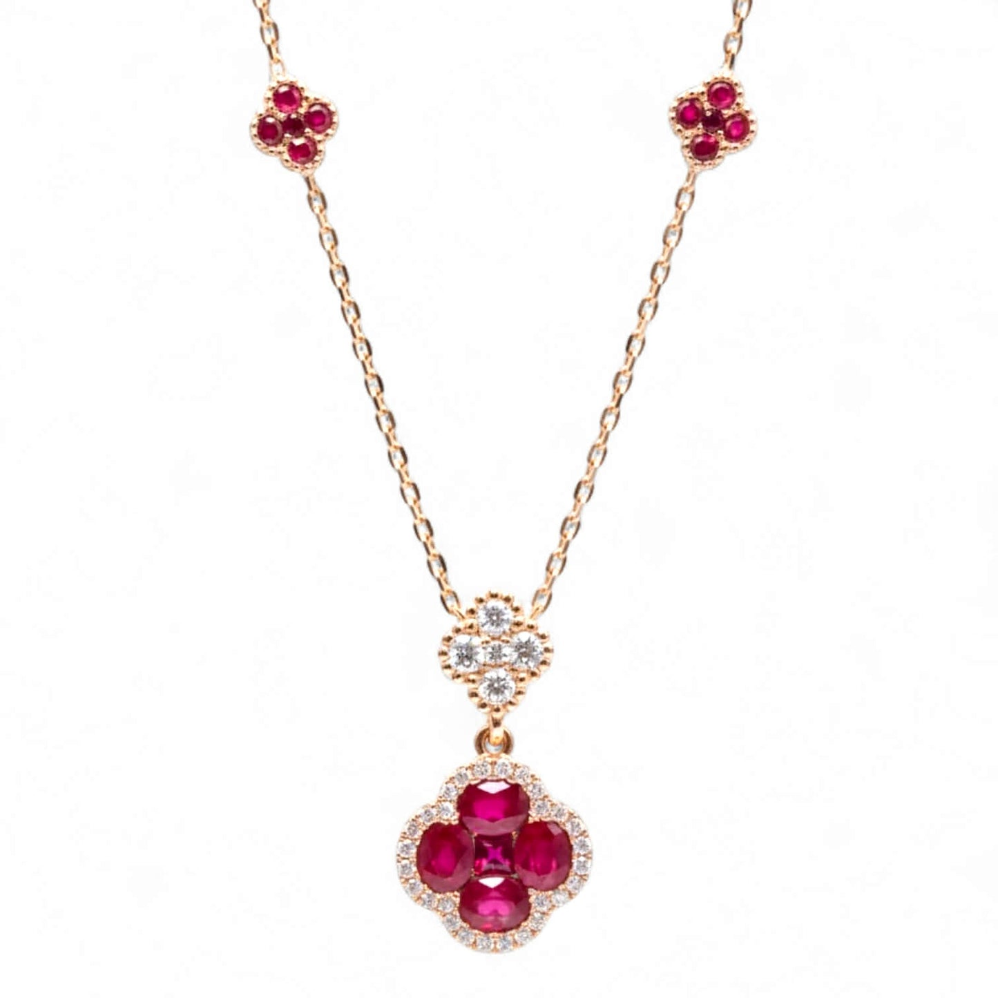 Collana in Oro Rosa con Fiori di Rubini e Diamanti – Simmi Gioielli