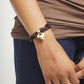 Bracciale uno de 50 in filo di seta e pelle marrone con cuore placcato oro 18k - PUL2640 - Simmi Gioiellerie - Bracciali