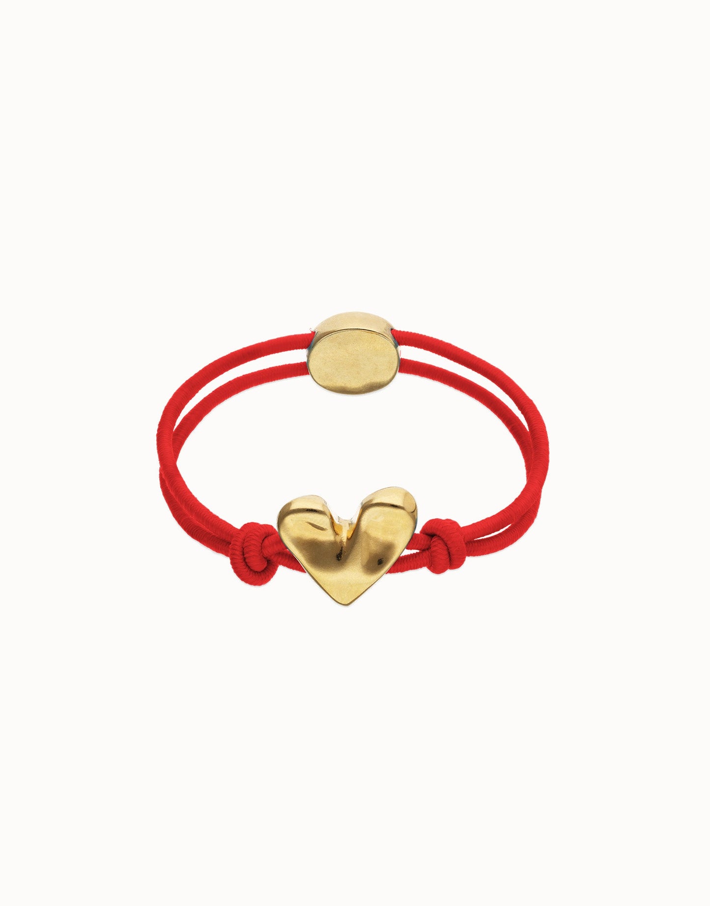 Bracciale Uno de 50 in filo elastico rosso con cuore placcato oro 18k - PUL2641 - Simmi Gioiellerie - Bracciali