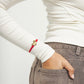Bracciale Uno de 50 in filo elastico rosso con cuore placcato oro 18k - PUL2641 - Simmi Gioiellerie - Bracciali
