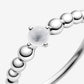 Anello bianco latte decorato con sfere - Simmi gioiellerie -Anelli
