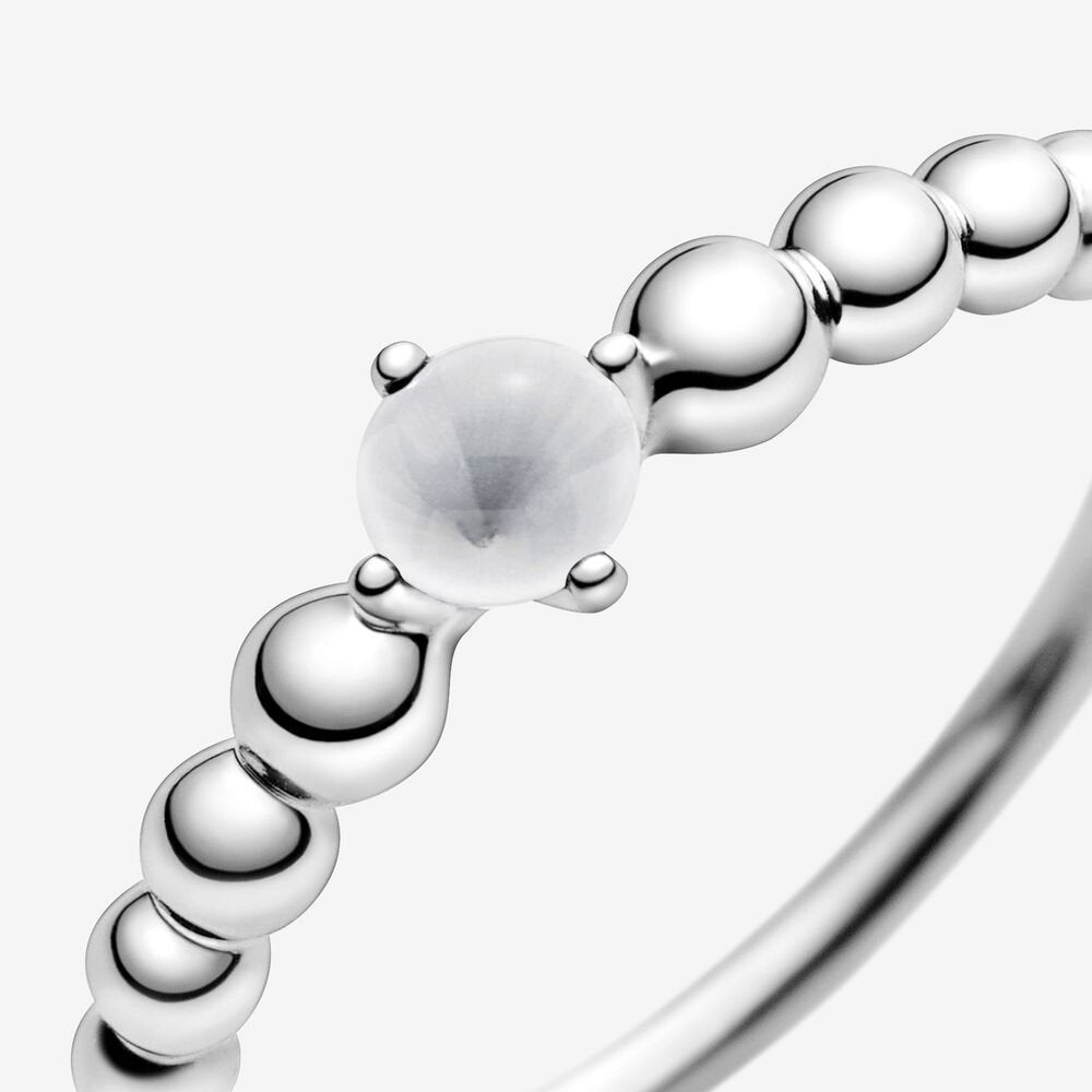 Anello bianco latte decorato con sfere - Simmi gioiellerie -Anelli